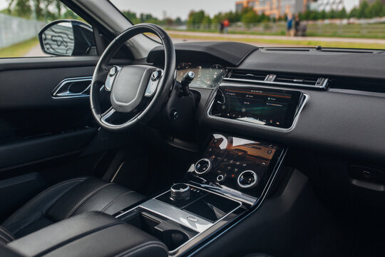 Modern car interior with the leather panel, and dashboard