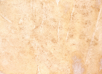 Old leather texture of drum light brown background