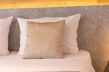 Pillows on a hotel bed, closeup