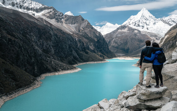 Couple in Laguna Paron lookout. Huascaran National Park, Peru