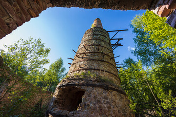 Old, overgrown, forgotten lime kiln