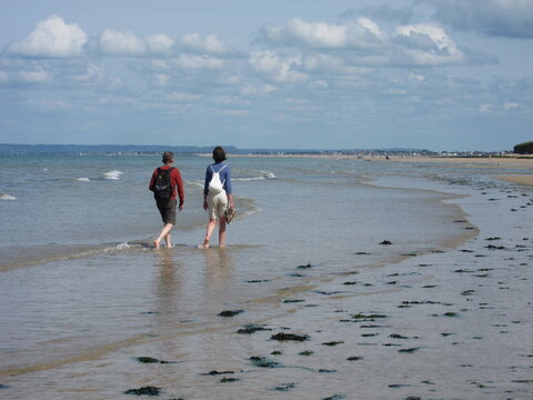 tourists on the beach in luc sur mer