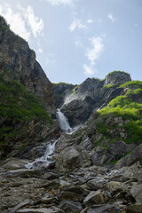 Fototapeta na wymiar waterfall on the way to Fridolinshütte SAC in the Glarus Alps