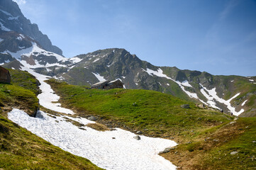 Fototapeta na wymiar Fridolinshütte SAC with peak of Tödi in the Glarus Alps