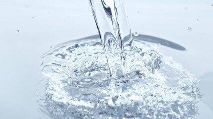 Super Slow Motion Shot of Pouring and Splashing Water at 1000 fps.