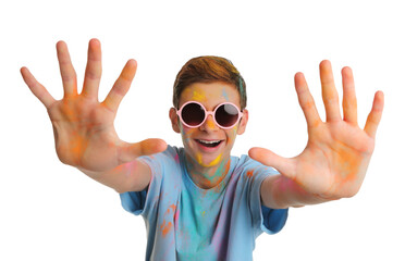 Naklejka premium Teen boy covered with colorful powder dyes on white background. Holi festival celebration