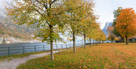 idyllic autumnal lake shore at tourist resort Ebensee, lake Traunsee, Salzkammergut