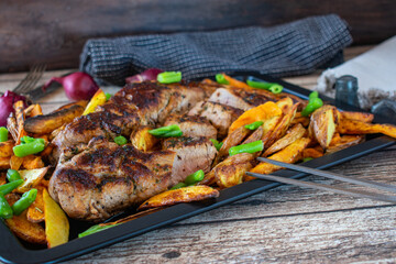 Grilled pork tenderloin with oven fries and green beans