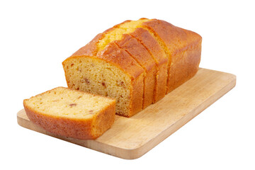 Sliced pound cake with lemon glaze on a cutting board isolated on a white background.