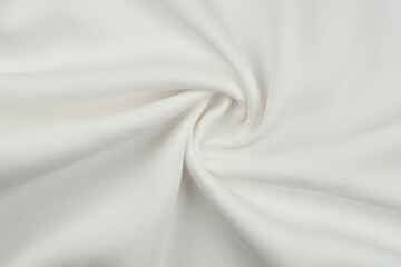 Obraz premium Background from white monochrome cotton fabric. Close up texture of the fabric is useful as a background.