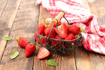 fresh strawberry fruit on wood background