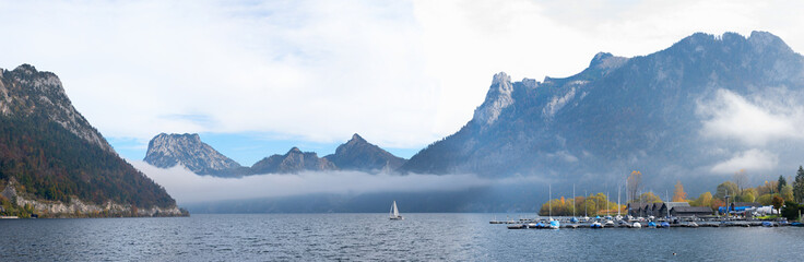 panorama landscape lake Traunsee, lakeside Ebensee with boathouses and harbor