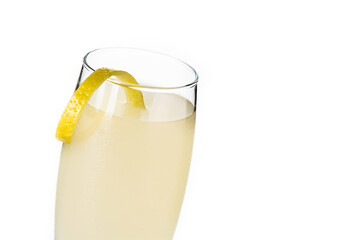 French 75 cocktail in glass isolated on white background. Copy space