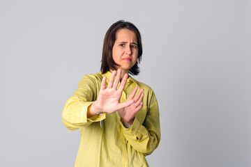Disgusted teen girl refusing something awful, express aversion, squinting, cringe from reek, smell...