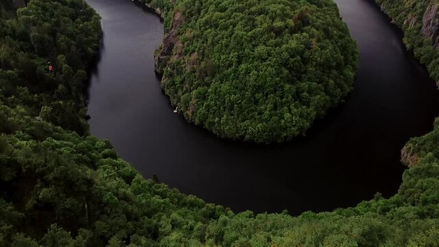 Aerial top view of natural canyon Vltava river like a horseshoe shape from Maj viewpoint.