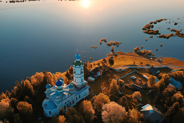 summer landscape in russia sunset, church on the banks of the river christianity orthodoxy - obrazy, fototapety, plakaty