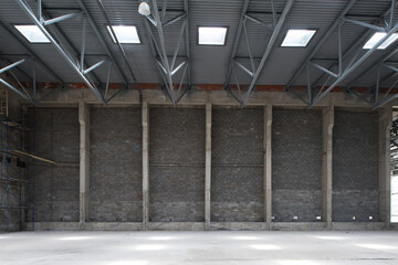 Large empty room. Manufacturing warehouse or construction site.