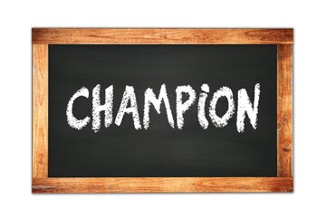 Fototapeta premium CHAMPION text written on wooden frame school blackboard.