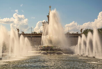 Fototapeta premium Fountain in the VDNKh city park in Moscow on a summer day