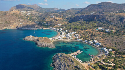 Fototapeta premium Aerial drone photo of beautiful twin bay, beach and small village of Kapsali below iconic castle of Kythera island, Ionian, Greece