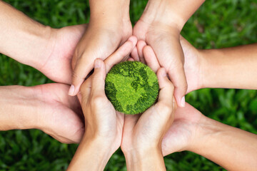Earth Day. Hands adult Teamwork harmony  Holding earth on hands. Environmental and reduce global...