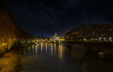 Amazing night view of Vatican city and St. Peter's church on Tevere river, with reflection, Rome, Italy