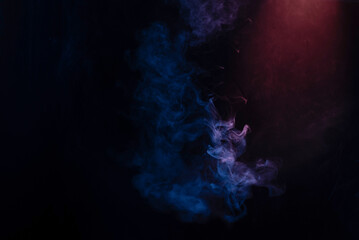 Blue and pink steam on a black background.