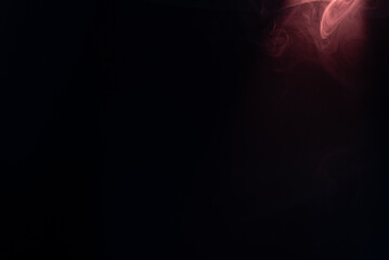 Blue and pink steam on a black background.