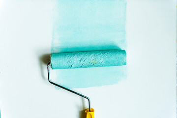 Flat lay of paint roller isolated on white background