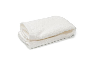 White fluffy cotton towel isolated on a white background.