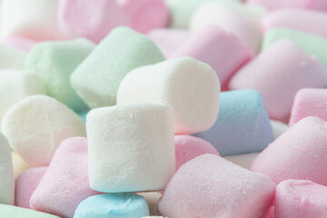 Colorful marshmallows background close up. 