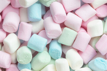 Colorful marshmallows background close up.