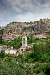 Fototapeta na wymiar Church in the rock, Monastery in the mountains, Christian Church in the Rock