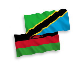 National vector fabric wave flags of Malawi and Tanzania isolated on white background. 1 to 2 proportion.