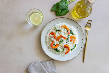 Risotto with shrimps and spinach. Healthy food. Vegetarian food.
