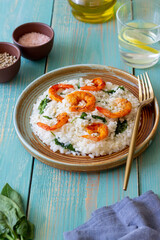 Risotto with shrimps and spinach. Healthy food. Vegetarian food.