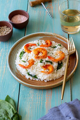Risotto with shrimps and spinach. Healthy food. Vegetarian food.