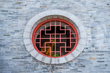 Chinese ancient architecture circular hollow framed flower window