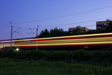 The electric train left behind a beautiful trail of headlights