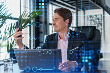 Businessman in suit using smart phone to optimize development by implying new technologies in...