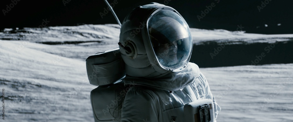 Wall mural portrait of asian lunar astronaut opens his visor while exploring moon surface