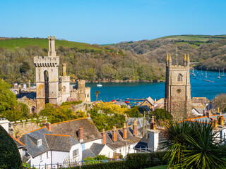 Ancient buildings are part of the rooftop skyline at Fowey, on the south coast of Cornwall, UK,...
