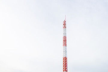remote picture of Antenna radio communication tower building industrial use small and blue sky