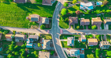 Aerial view of an intersection in the residential area. - obrazy, fototapety, plakaty