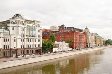 View of the Yakimanskaya embankments.On the waterfront walk people