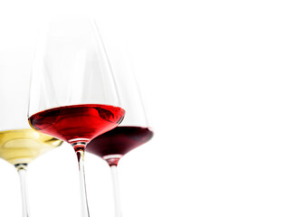Closeup of three glass of red, rose and white wine isolated over white background. Wine list menu design with copyspace. Wineglasses with luxury wines for wine tasting. - 440970966