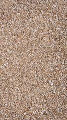 small stones, gravel rocks surface background texture, wallpaper backdrop