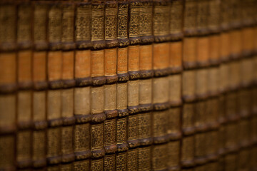 Old book, codex in a library. Reading is relaxing. Communication and knowledge before the internet.