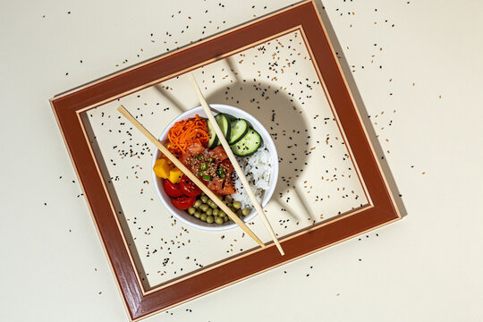 Bowl with poke behind frame