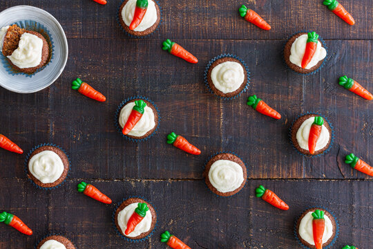 Background of carrots with cupcakes